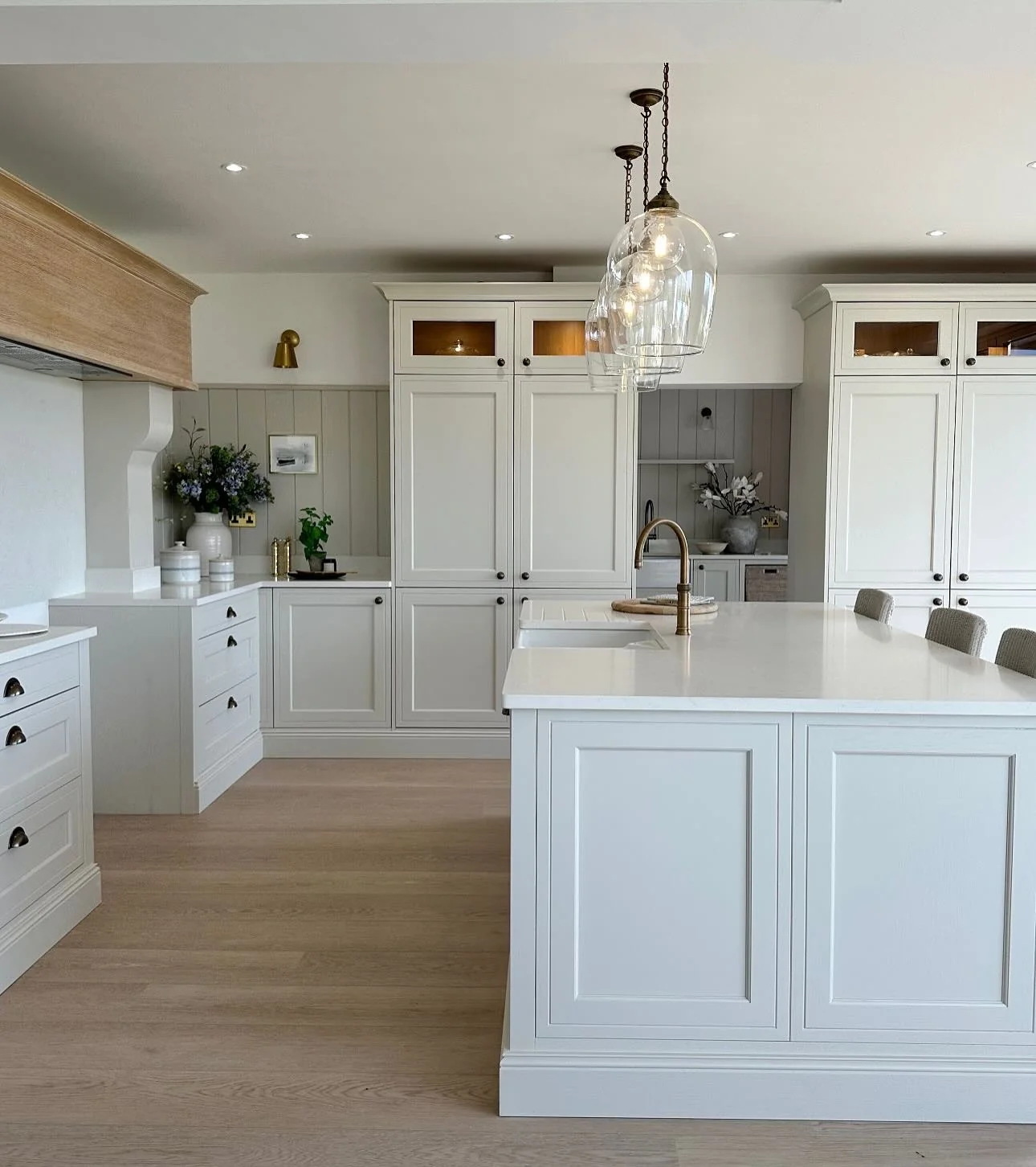 Bell-Shaped Glass Pendants Add a Delicate Touch Above Your Island