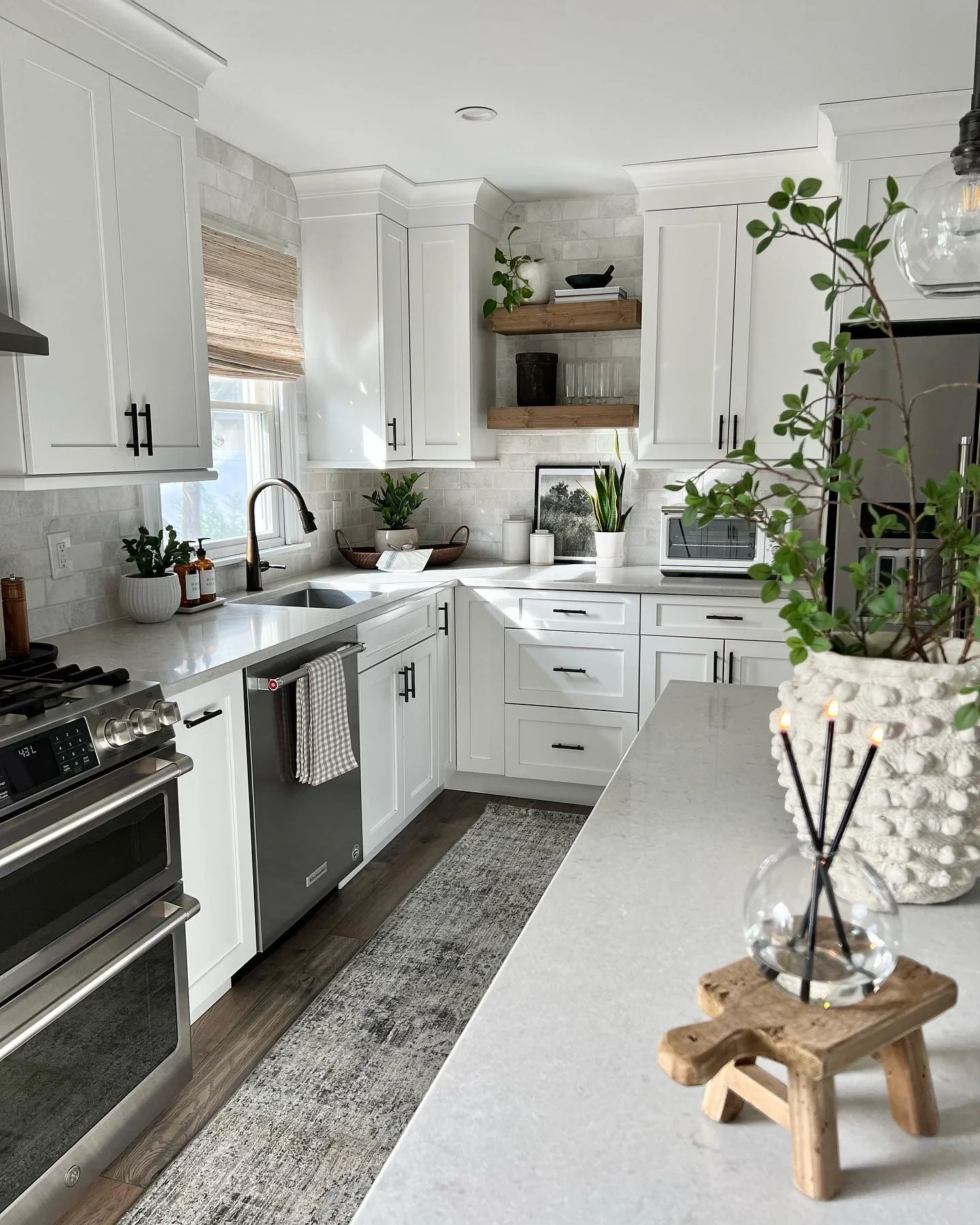 Wooden Shelves Add Warm, Natural Contrast to White Cabinets