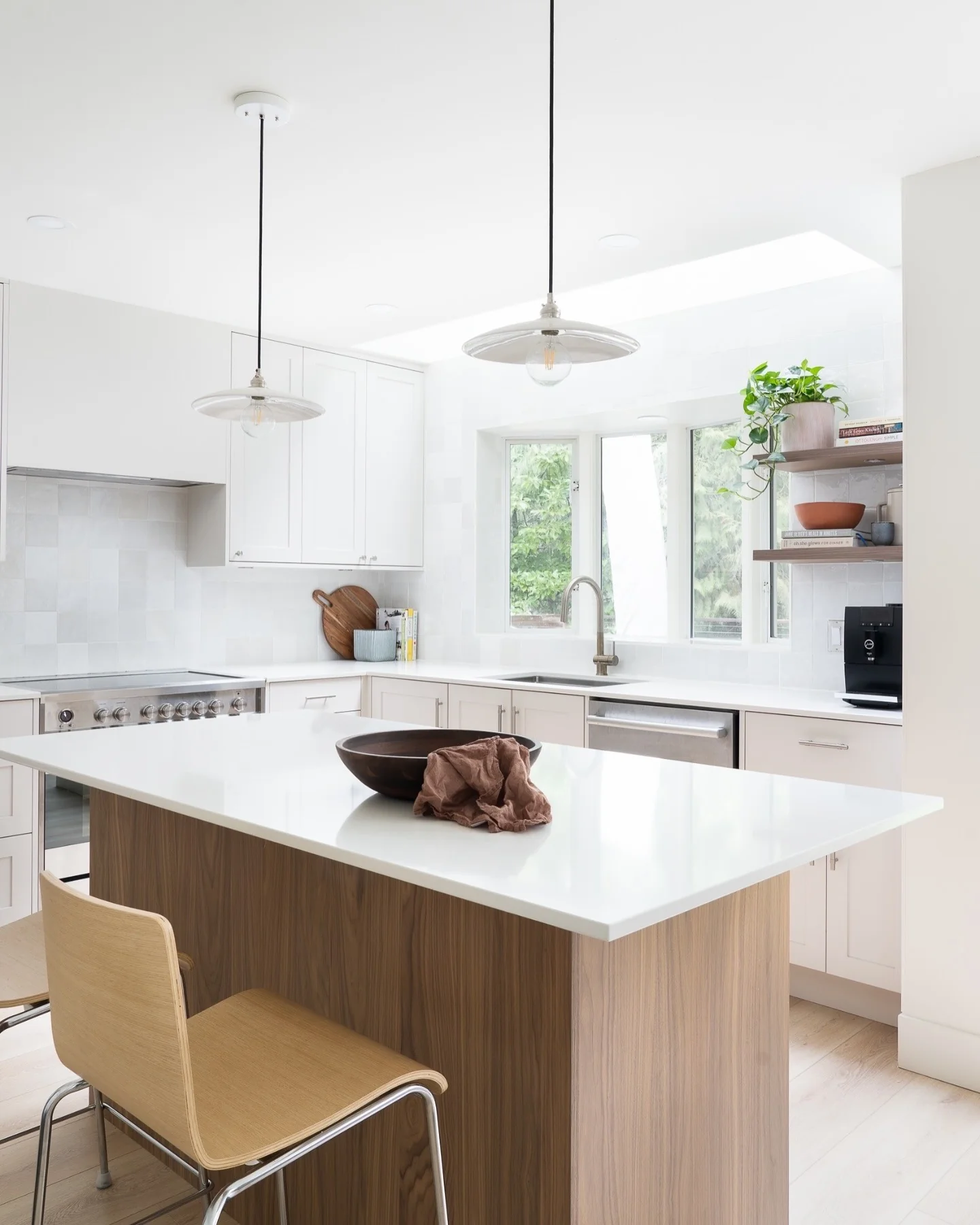 Wide Kitchen Island With Warm Wood Grain Accents