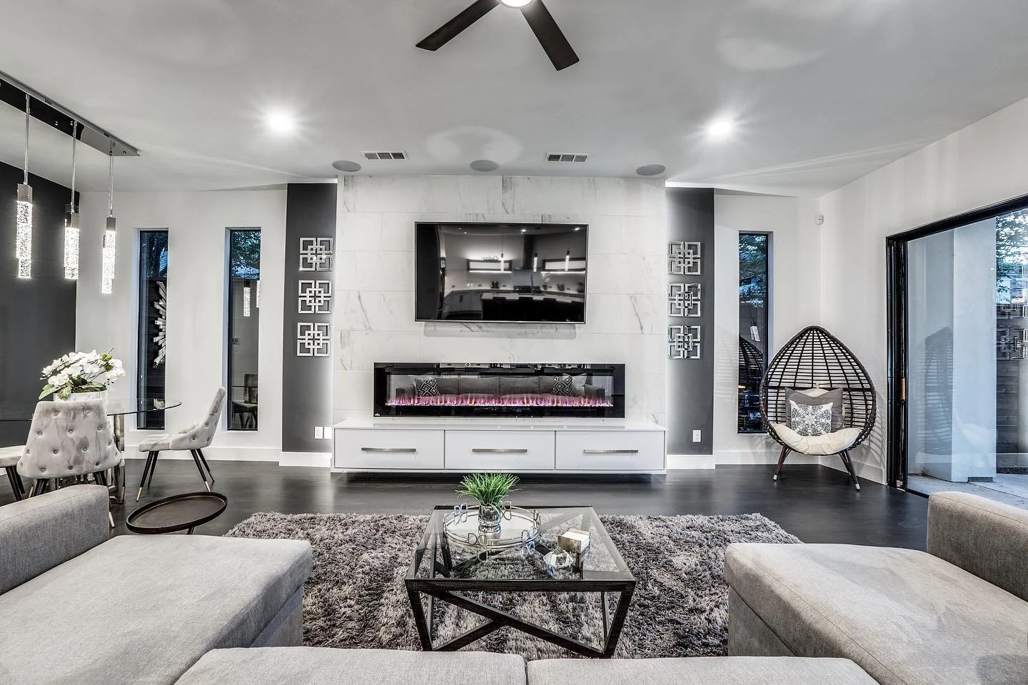 Geometric Metal Panels Add Rugged Texture Beside the Fireplace