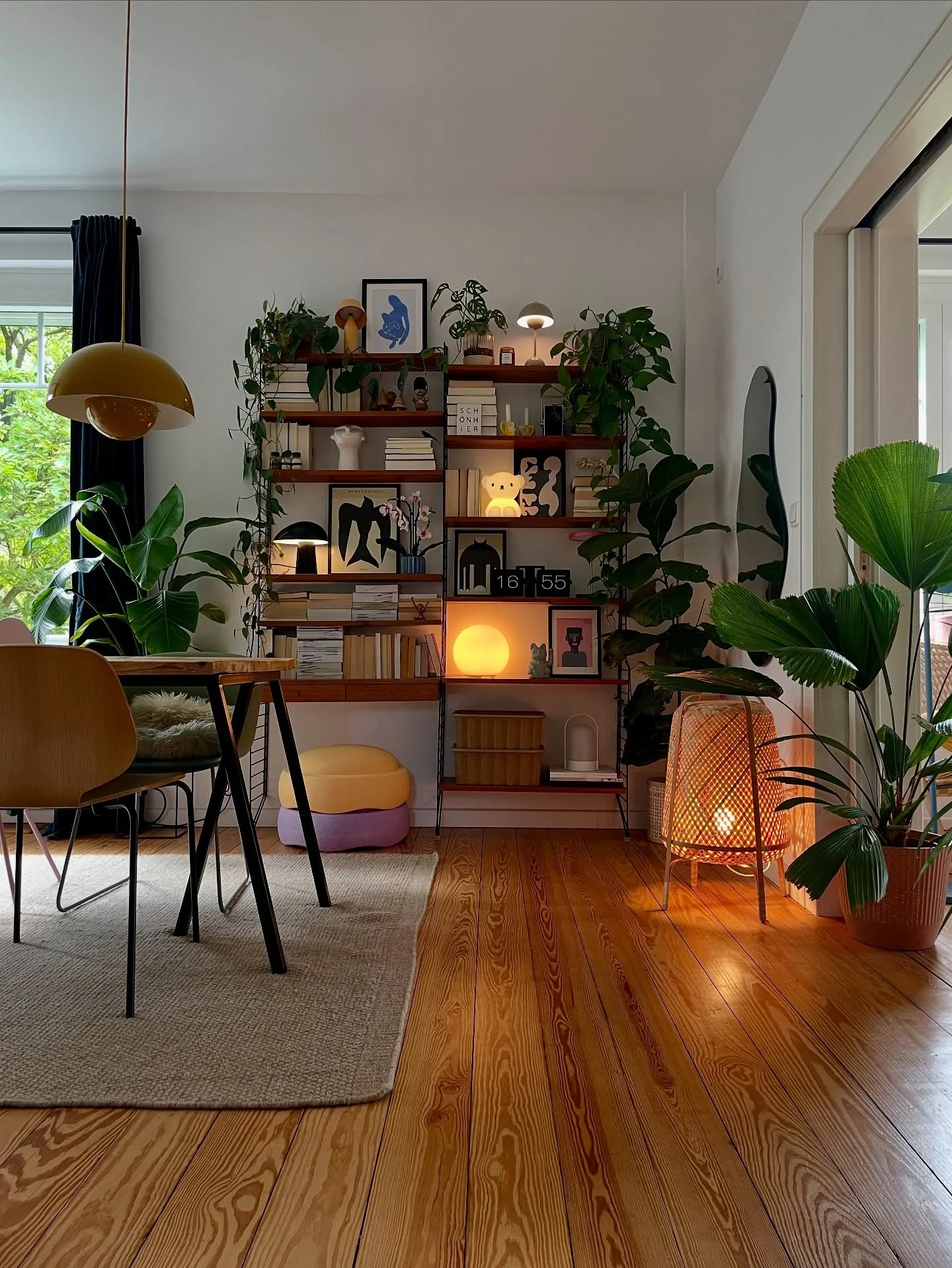 Woven Lamp Creates a Warm Glow Near Lush Greenery