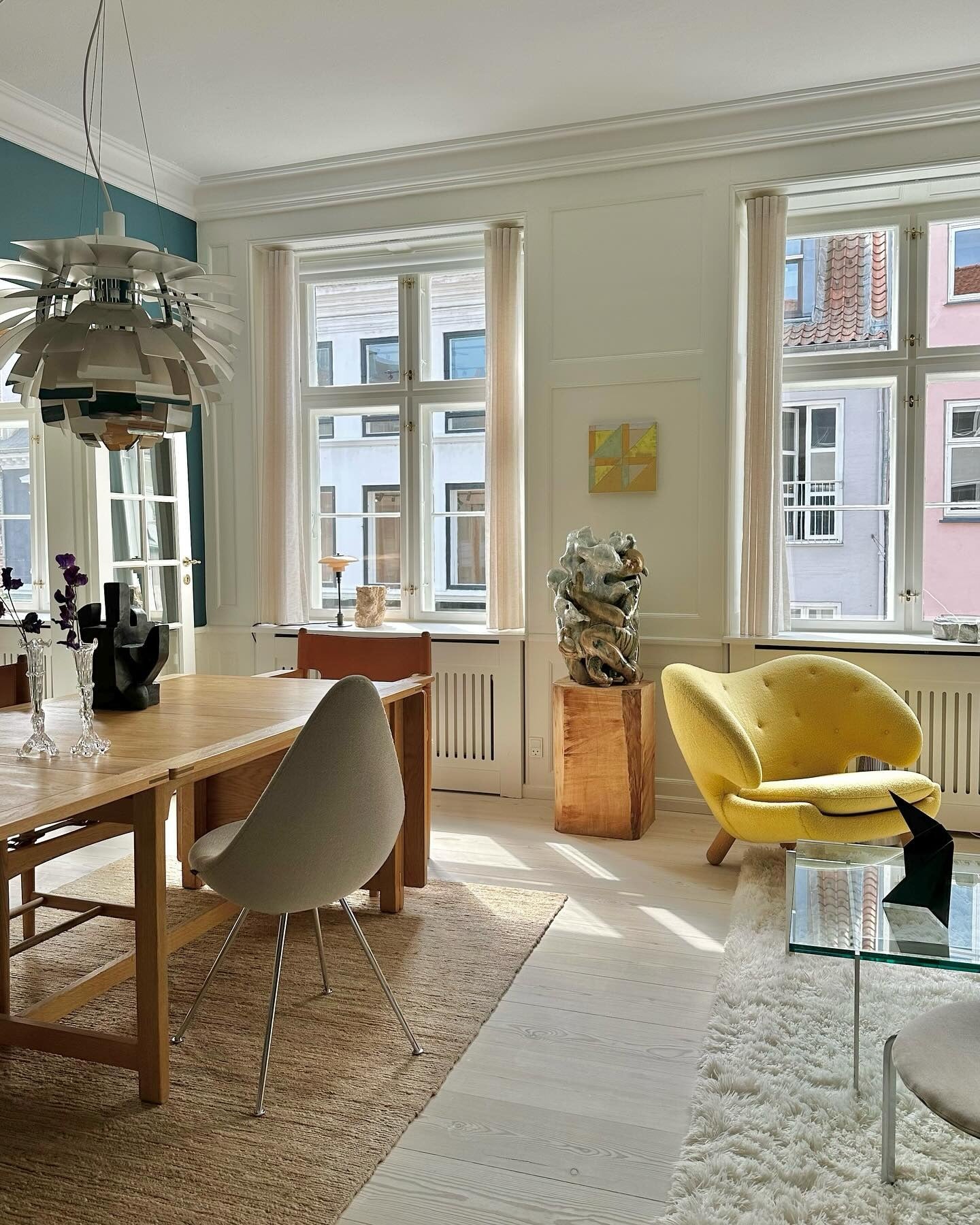 Pair a Yellow Armchair With Sculptural Art