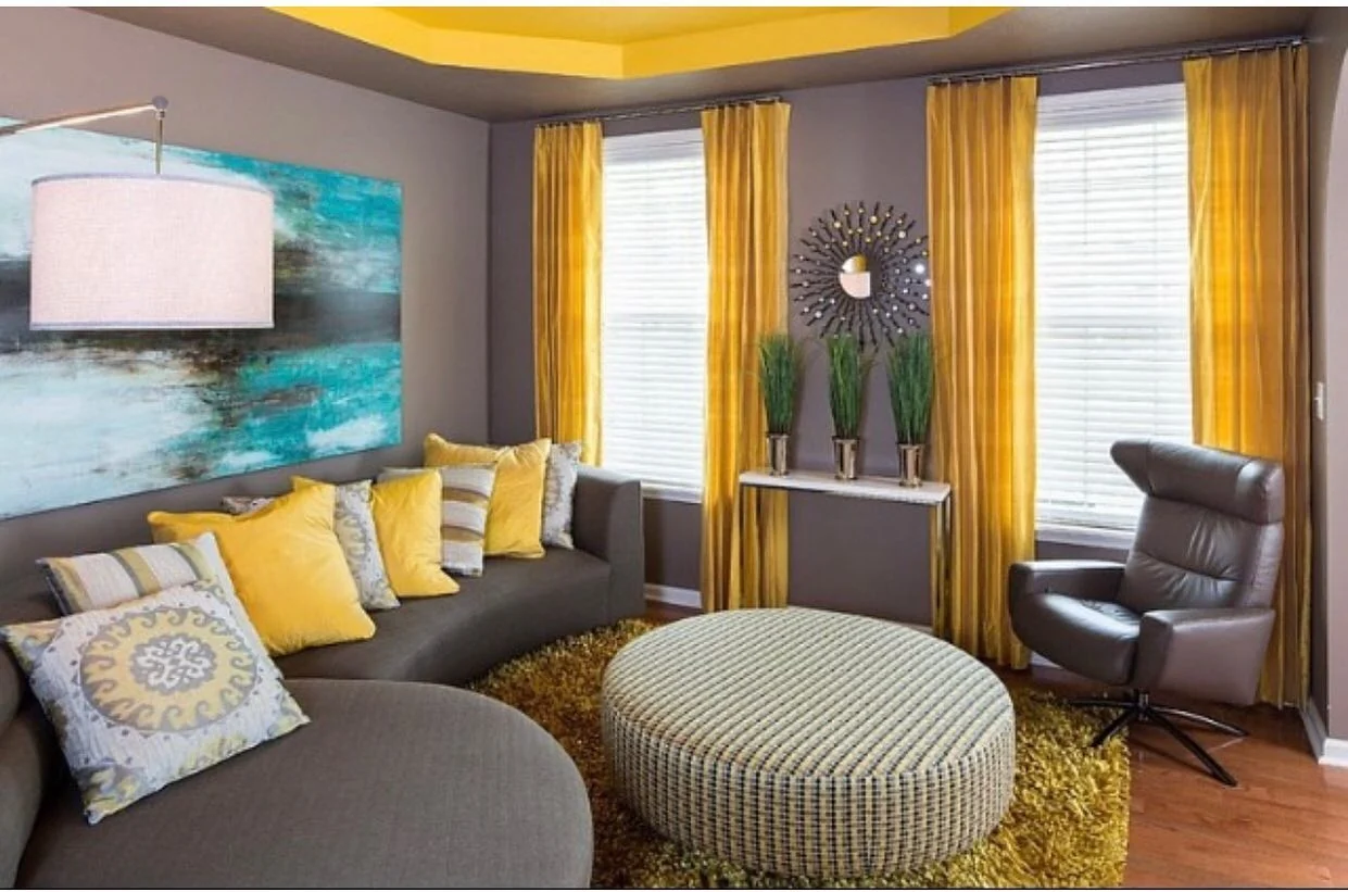 Layer Pillows for Depth on a Gray Sofa