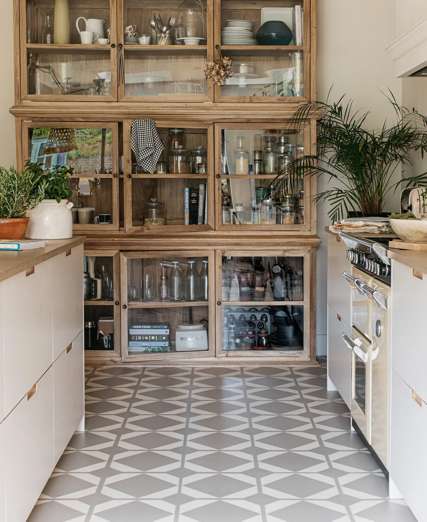 Geometric Tile Floor Adds Graphic Interest to Kitchen