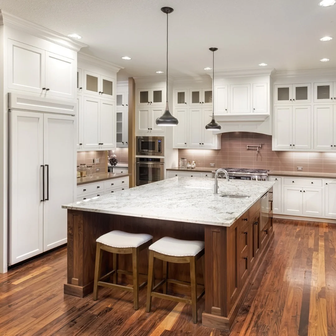 Warm Wood Flooring Adds Rich Texture to White Kitchens