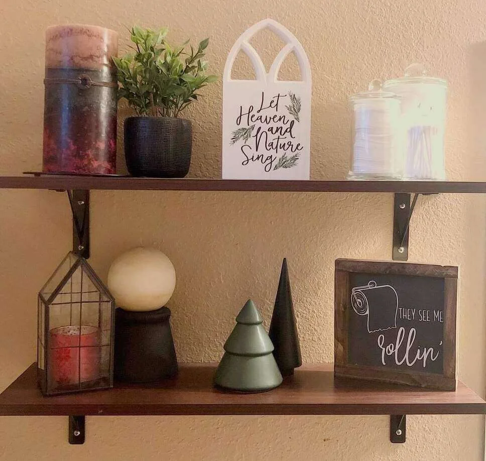 Arched White Sign Adds a Gothic Touch to Shelf Decor