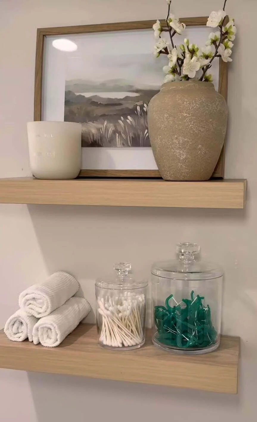 Clear Apothecary Jars Hold Dental Flossers and Cotton Swabs