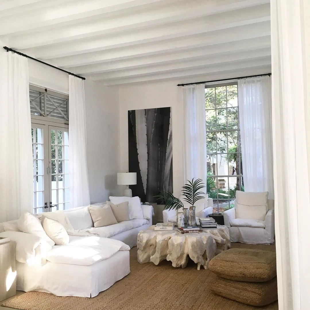 Oversized Botanical Art Adds Dramatic Scale to White Walls