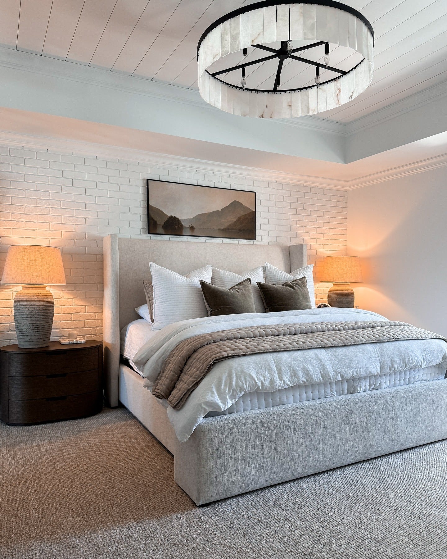 White Brick Accent Wall Adds Textured Depth Behind Bed