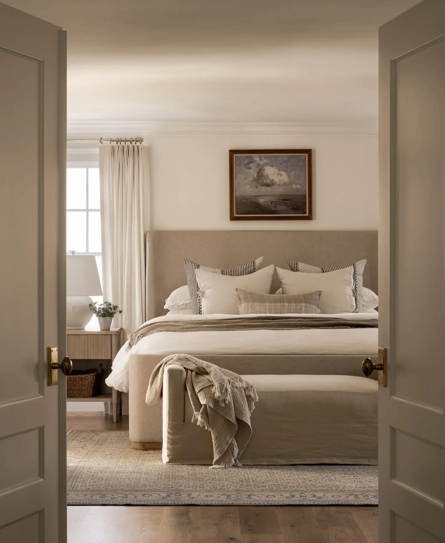 Textured Cream Upholstered Bench for Layered Bedding