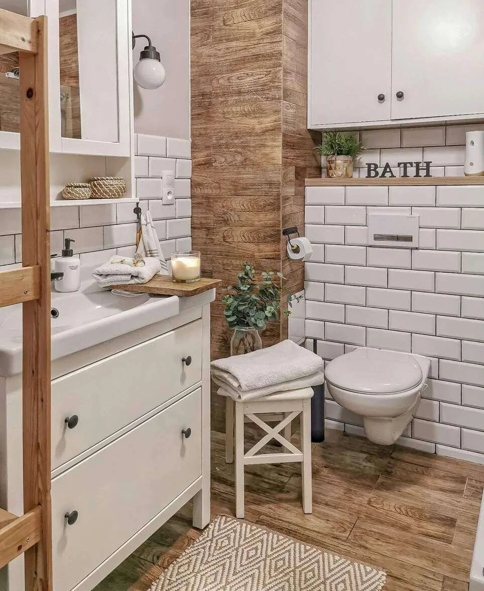 Wood Plank Accent Wall Adds Warmth to White Subway Tile