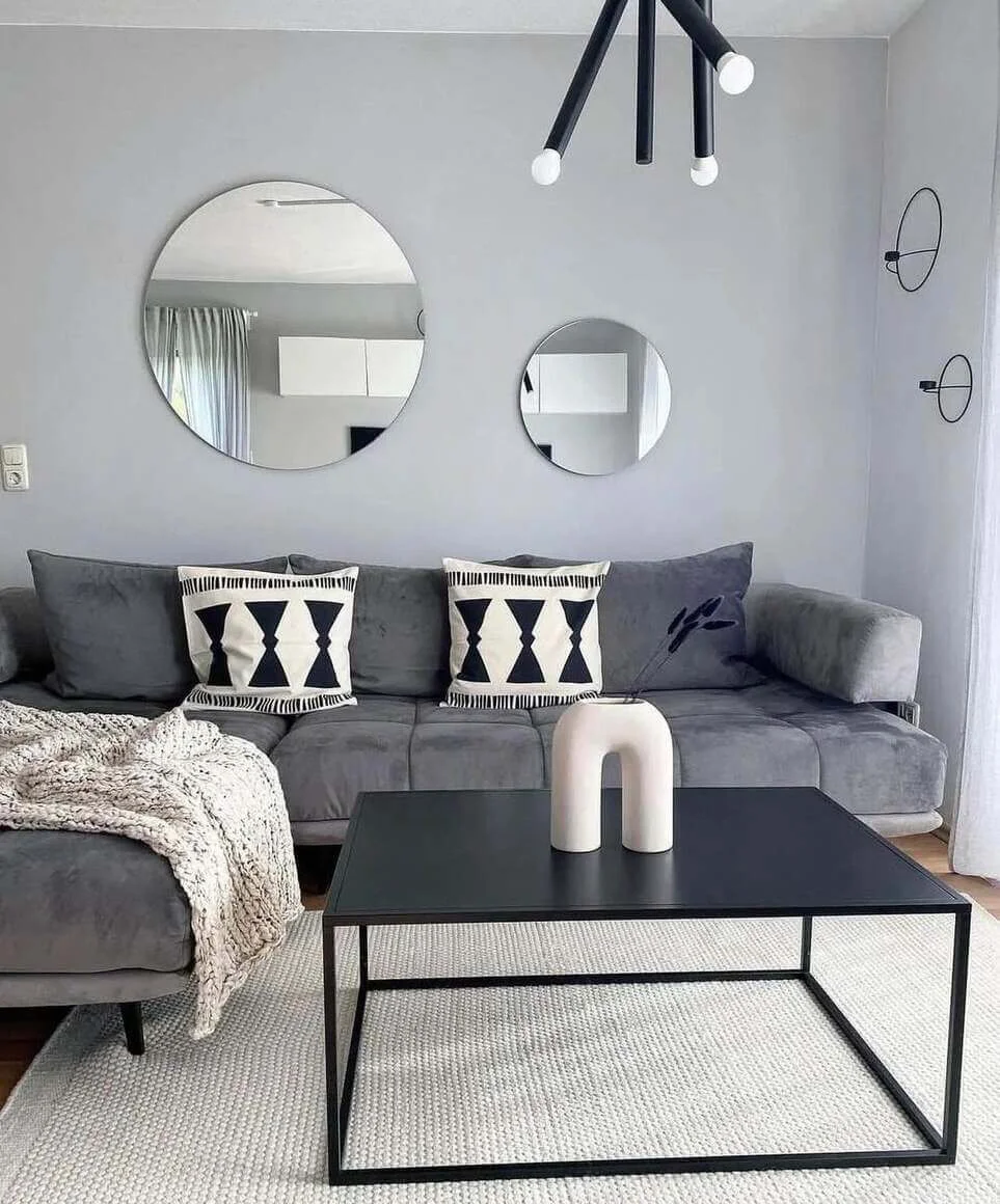 Two Round Mirrors Create A Playful Focal Point