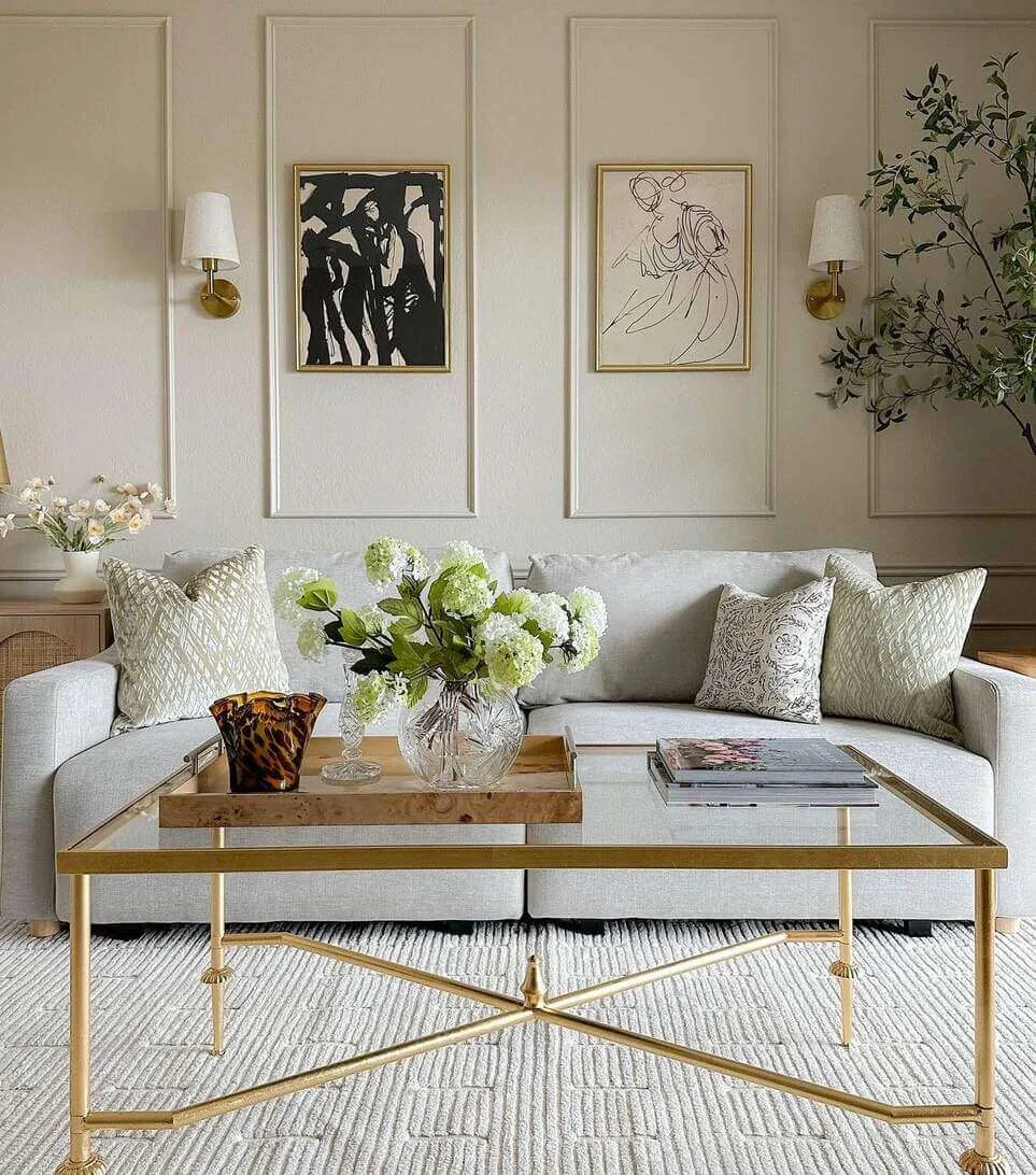 Two Abstract Art Pieces Frame A Cozy Seating Area