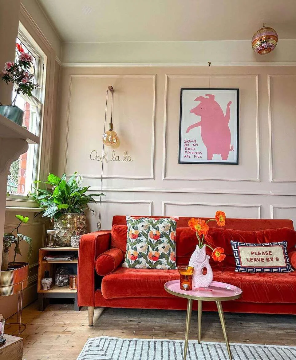 Whimsical Pig Art Adds Playful Personality Above Sofa
