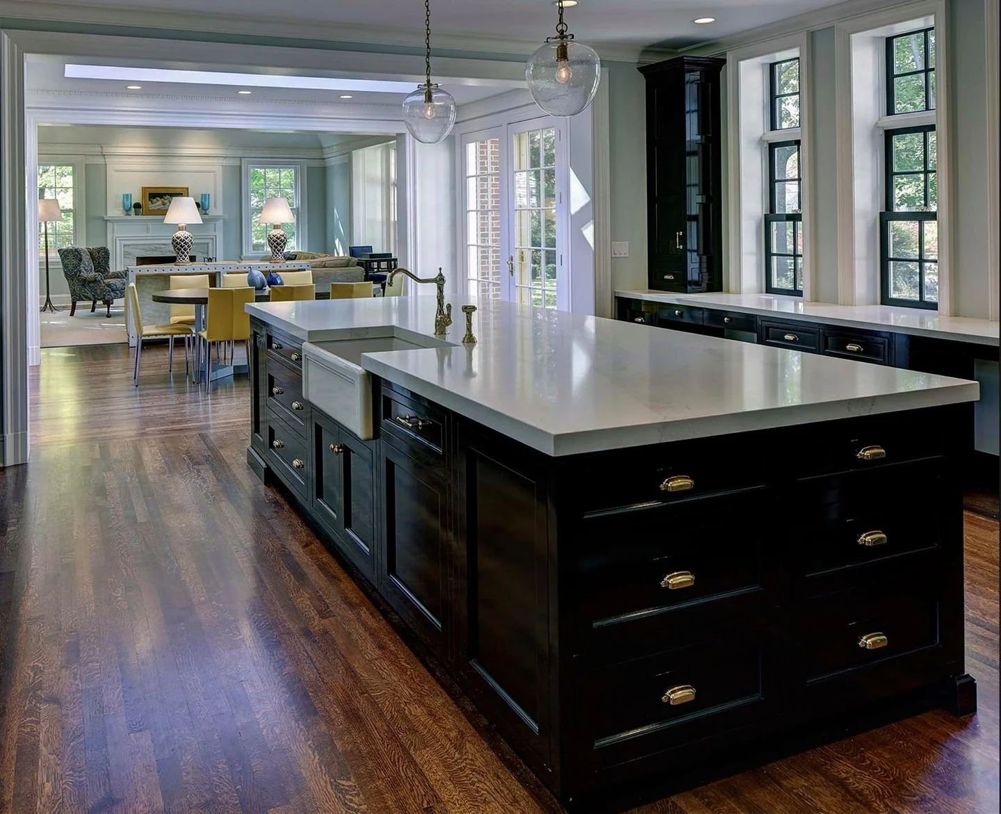 Dark Kitchen Island with Gold Hardware Offers Classic Appeal