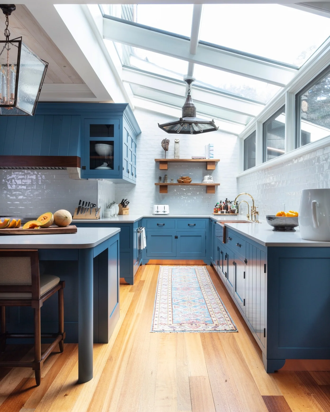 Blue Kitchen Cabinets with a Classic White Subway Tile Backsplash