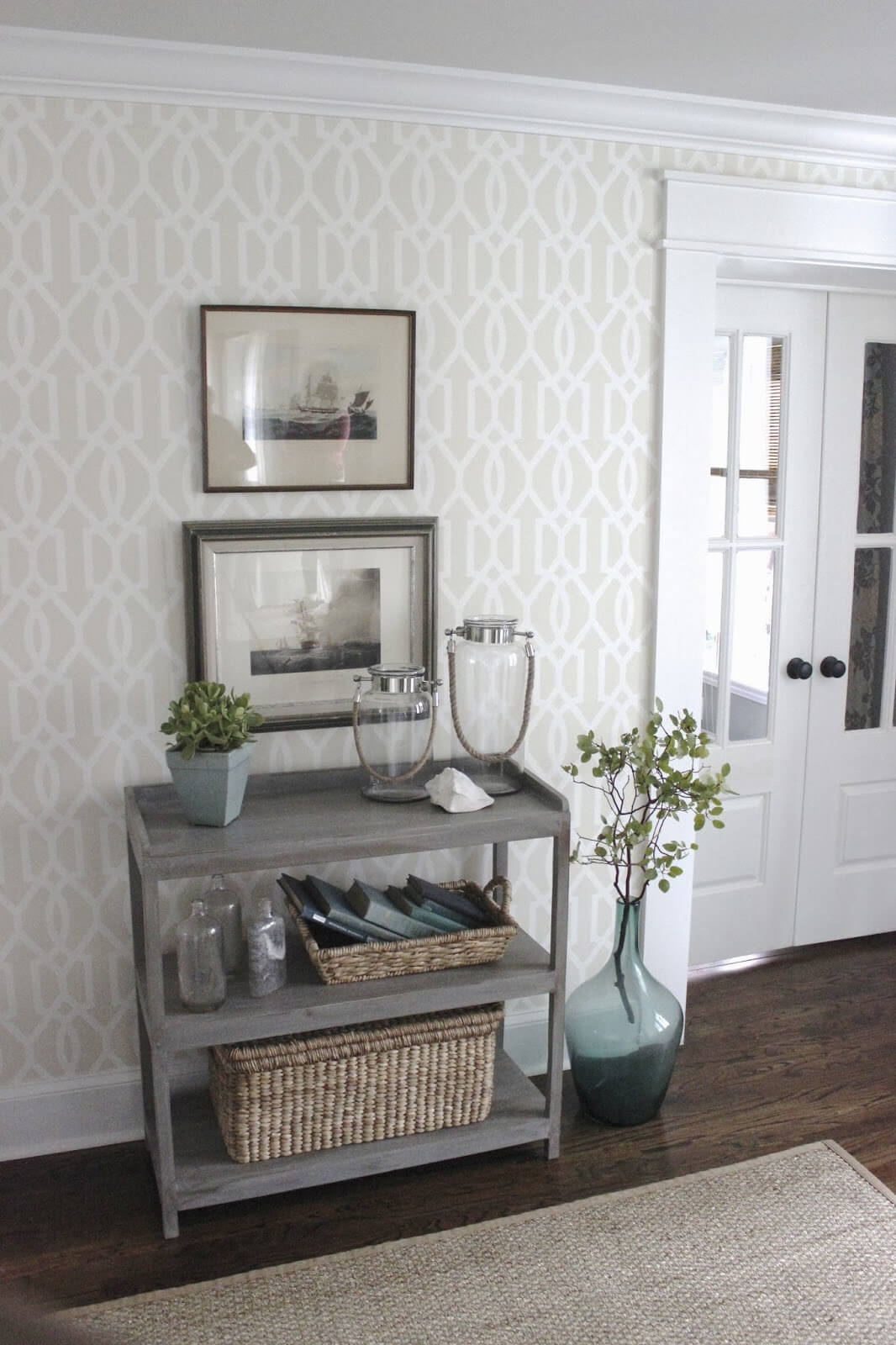 Layered Baskets Organize Entryway Essentials on a Gray Console