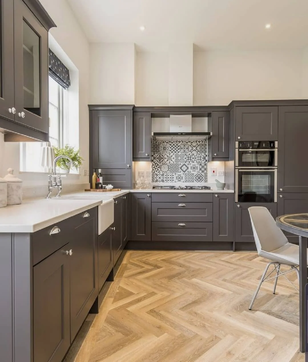 Patterned Grey and White Backsplash Adds Depth to Grey Cabinets