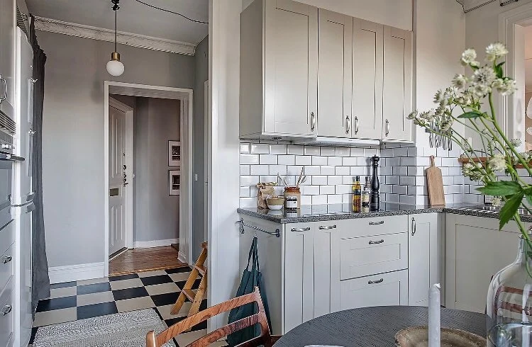 Grey Shaker Cabinets With Integrated Towel Rail