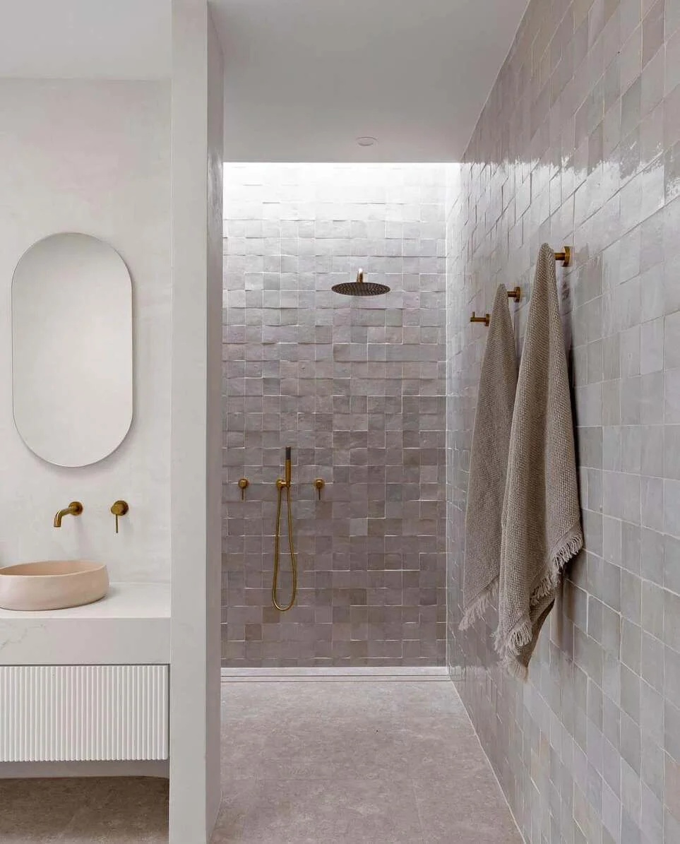 Subtle Square Tiles Create a Textured Shower Wall