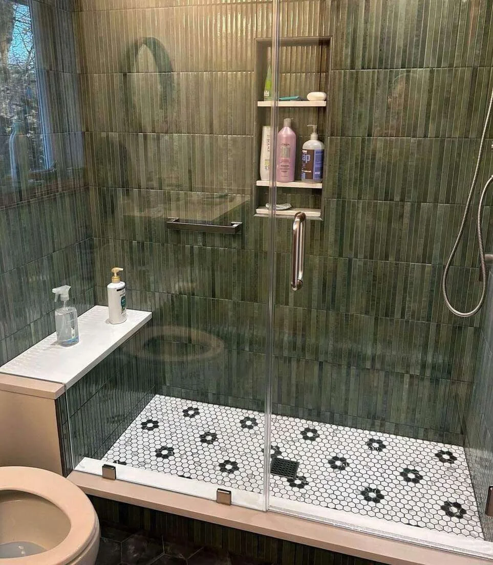 Vertical Ribbed Tiles Create a Moody Green Shower Oasis