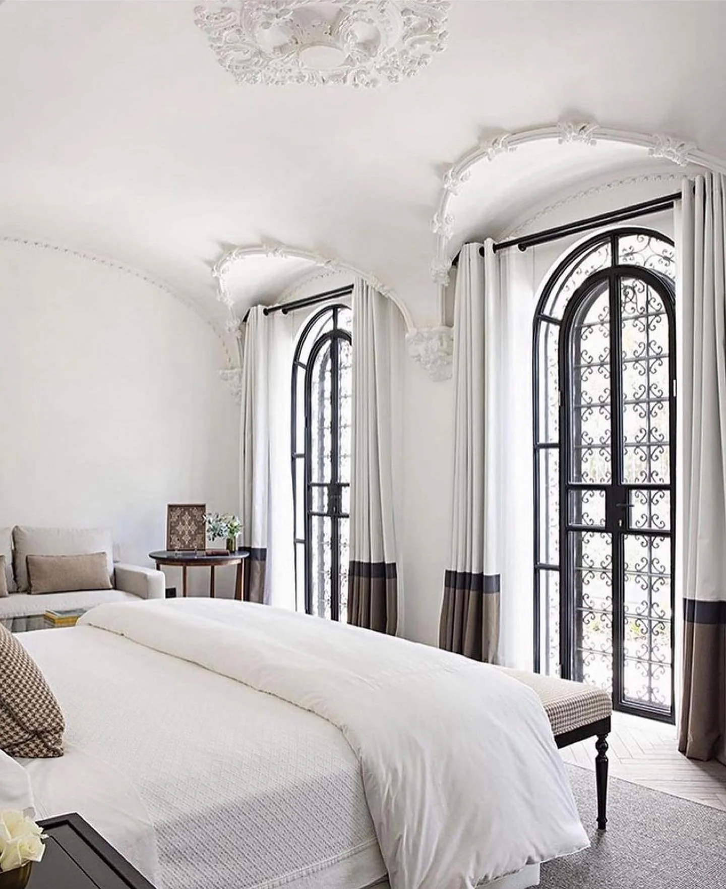 Arched Black Window Grilles Add Architectural Interest