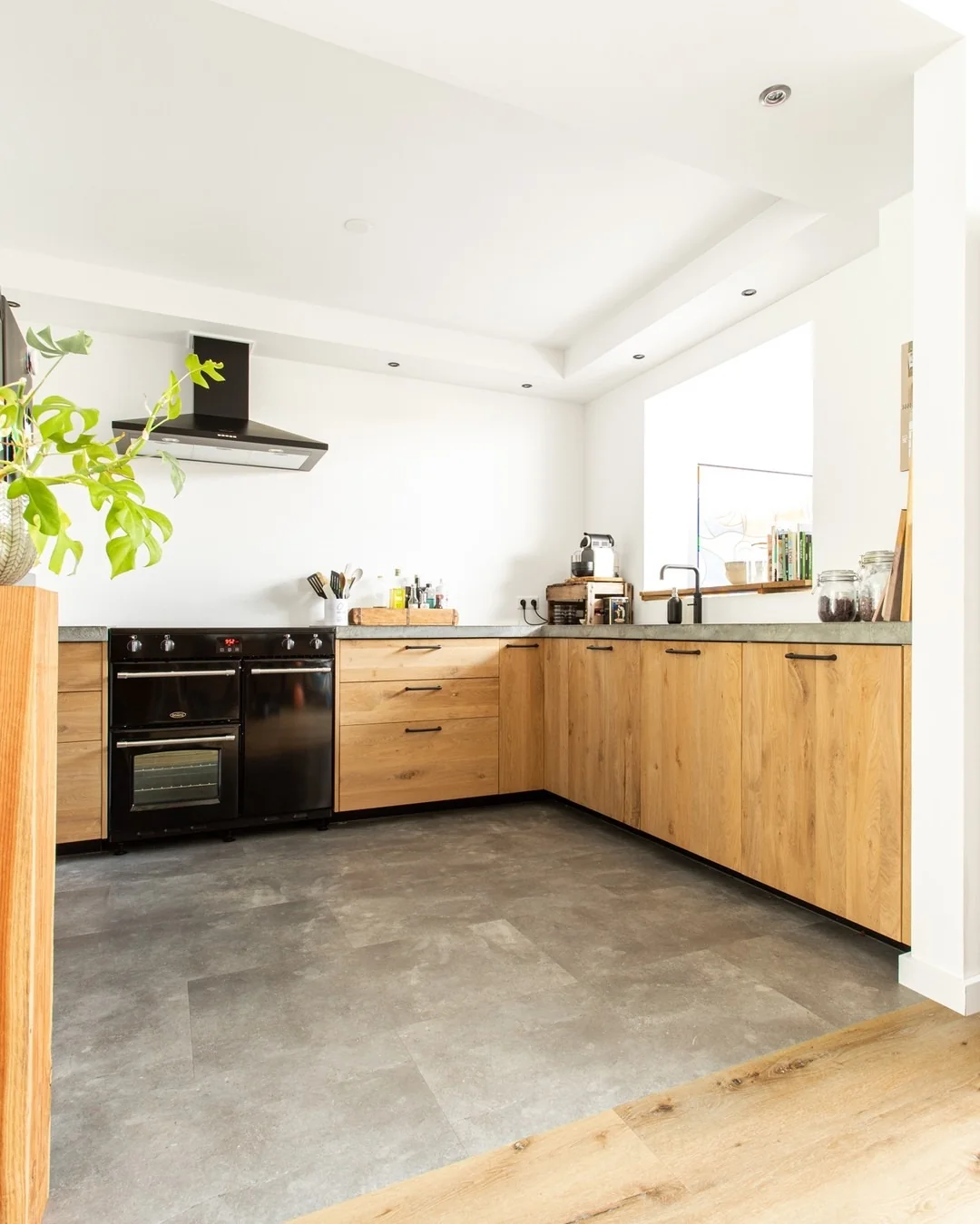 Soften Modern Lines with Natural Wood Cabinets