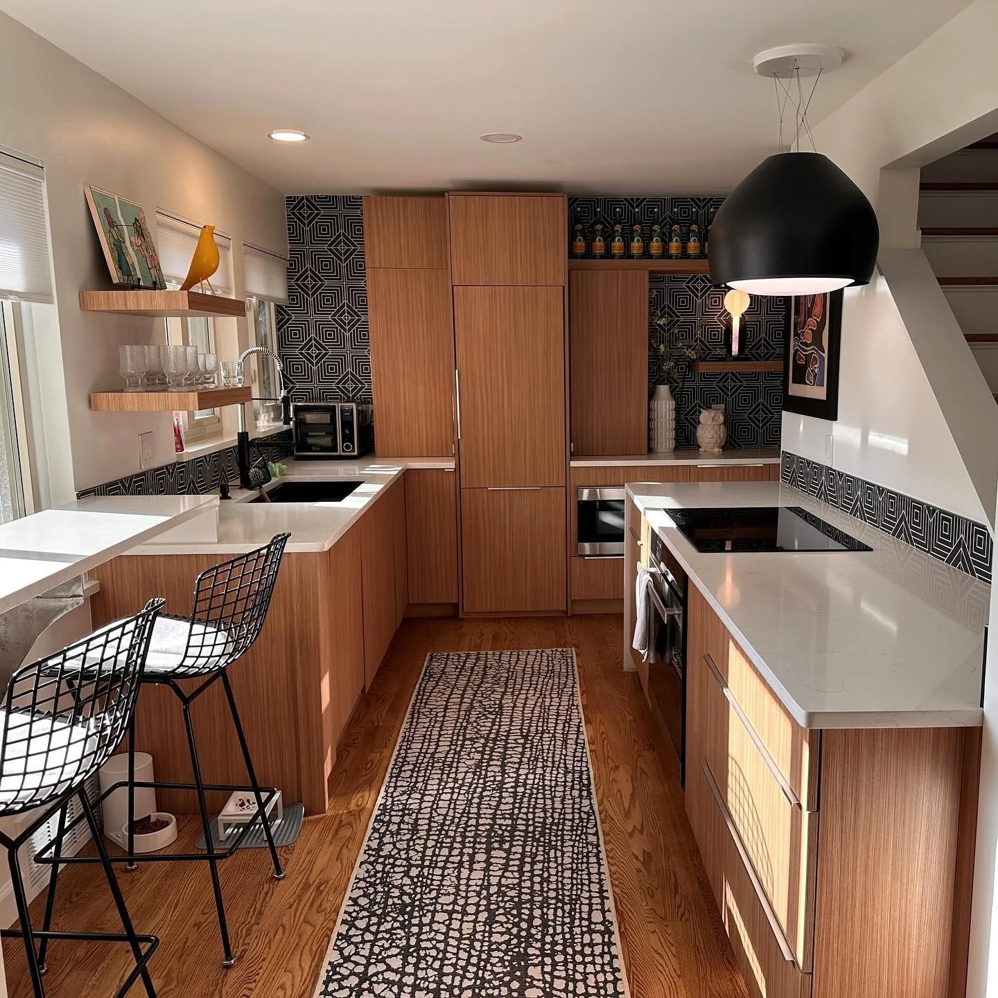 Geometric Black and White Tile Backsplash Adds Graphic Punch