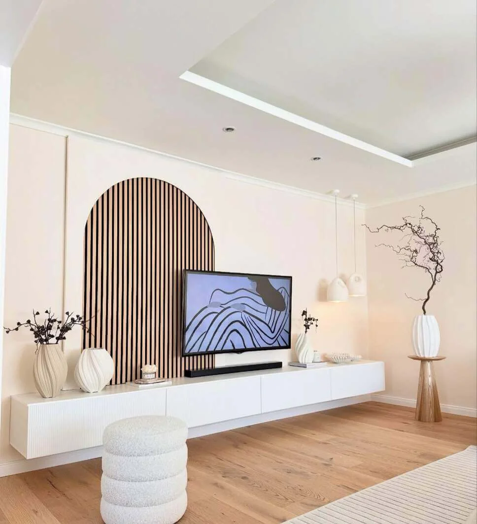 Arched Slat Wall Creates a Unique TV Backdrop