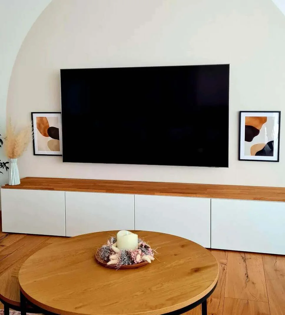 Abstract Art Prints Add Organic Shapes Beside TV