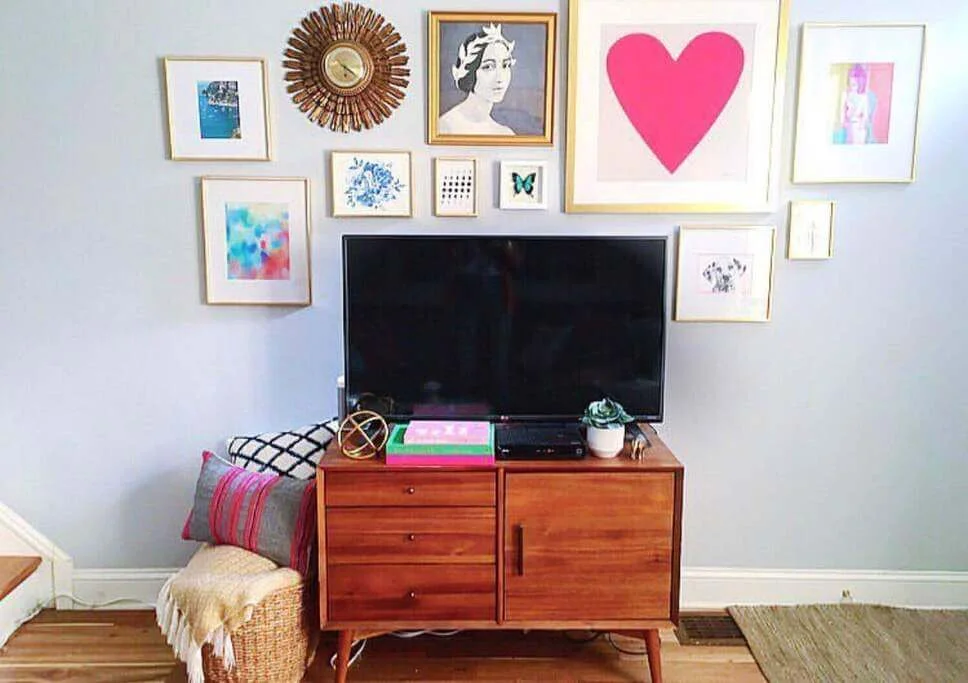 Gallery Wall Above TV Creates a Lively Backdrop
