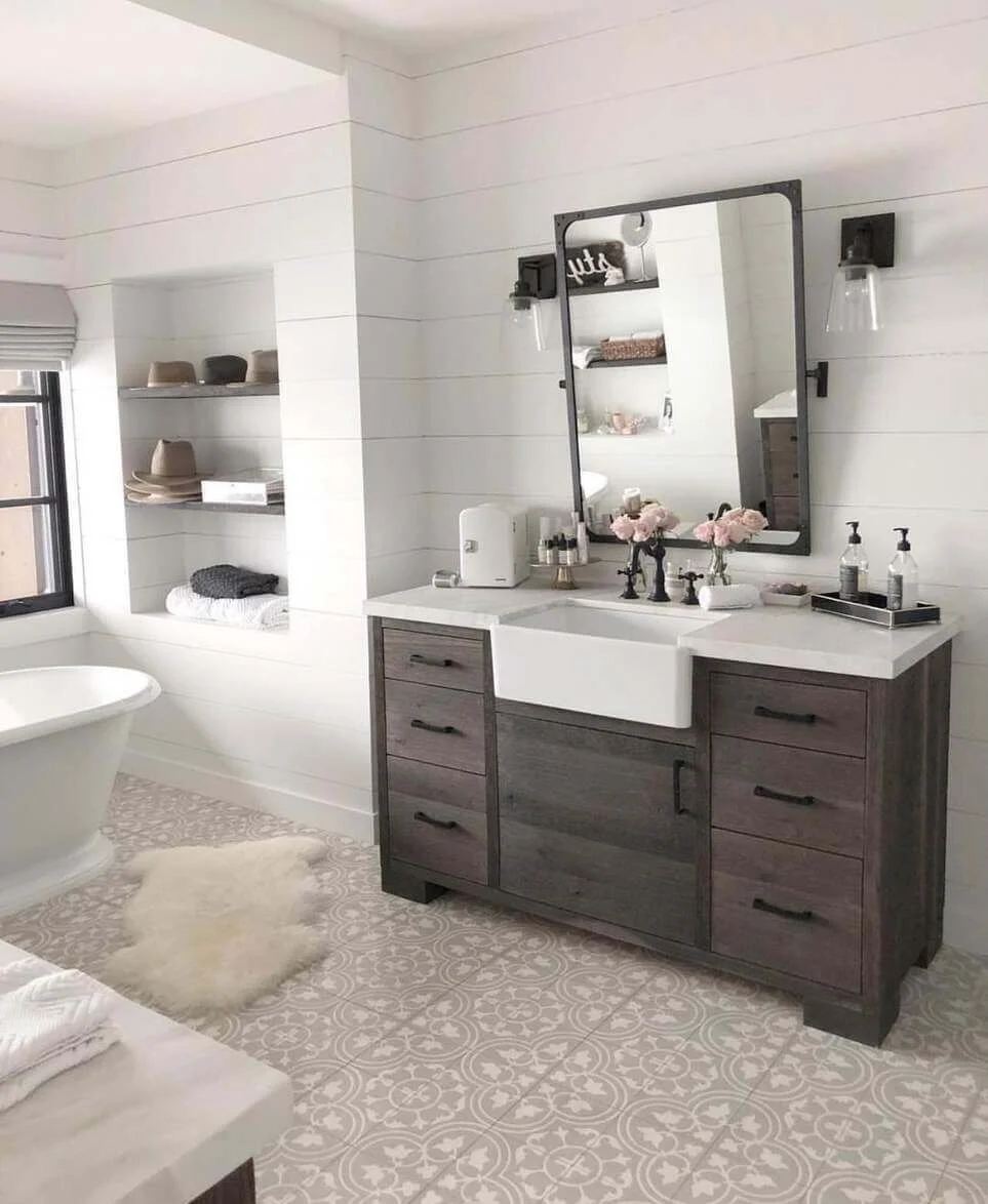 Ground Your Space with a Dark Wood Vanity and Farmhouse Sink