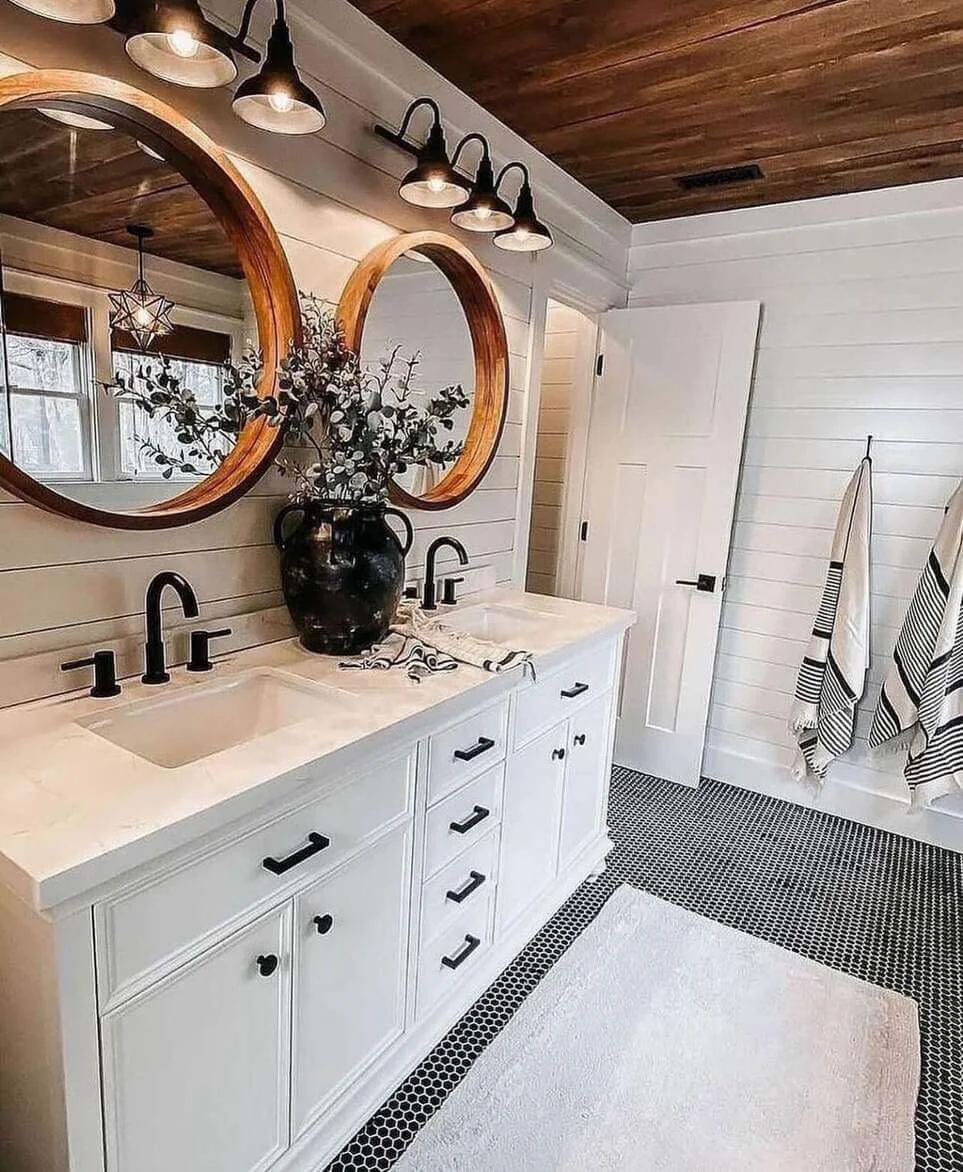 Soften a White Vanity with Round Wood-Framed Mirrors