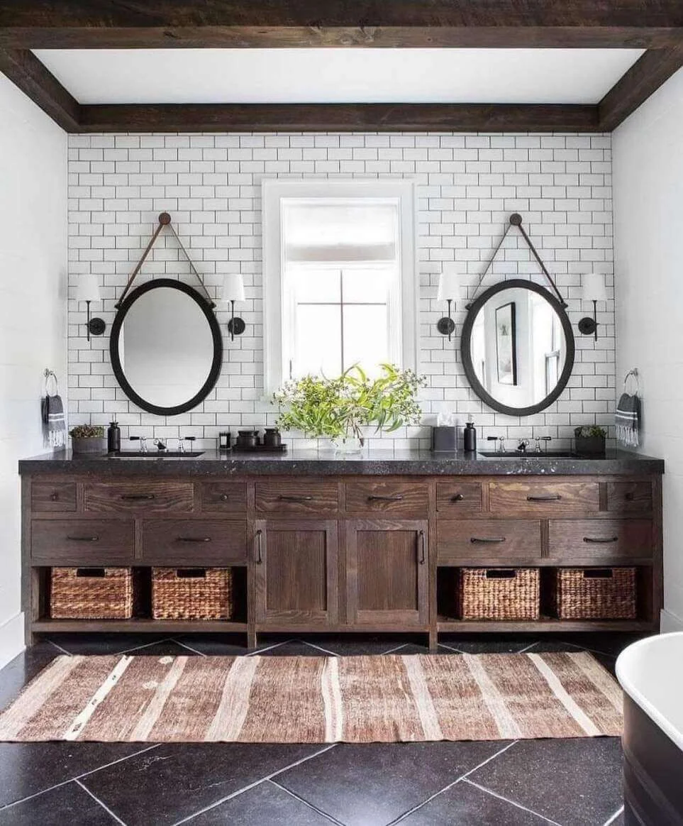 Oval Mirrors Hung With Leather Straps Frame Sinks