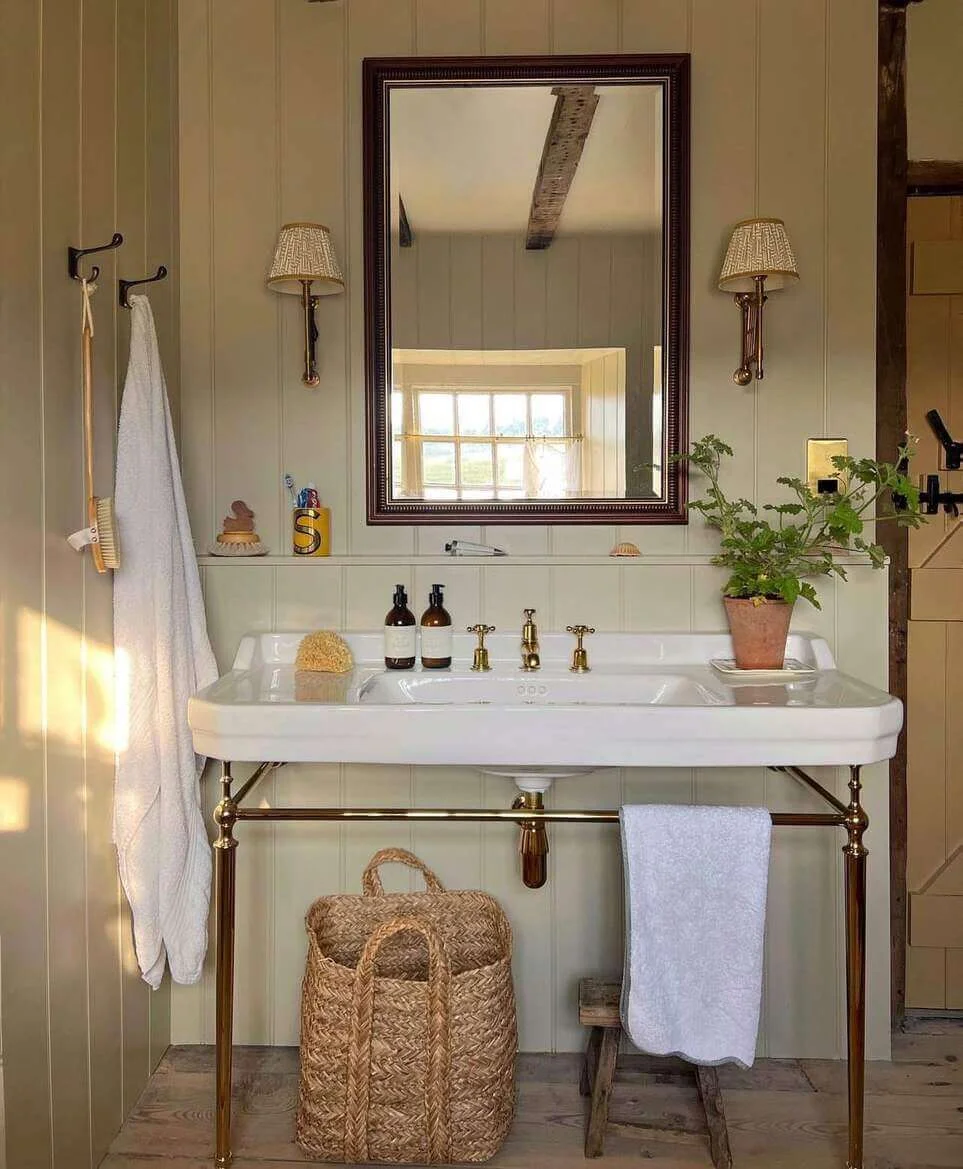 Keep Towels Accessible in a Woven Basket Below the Sink
