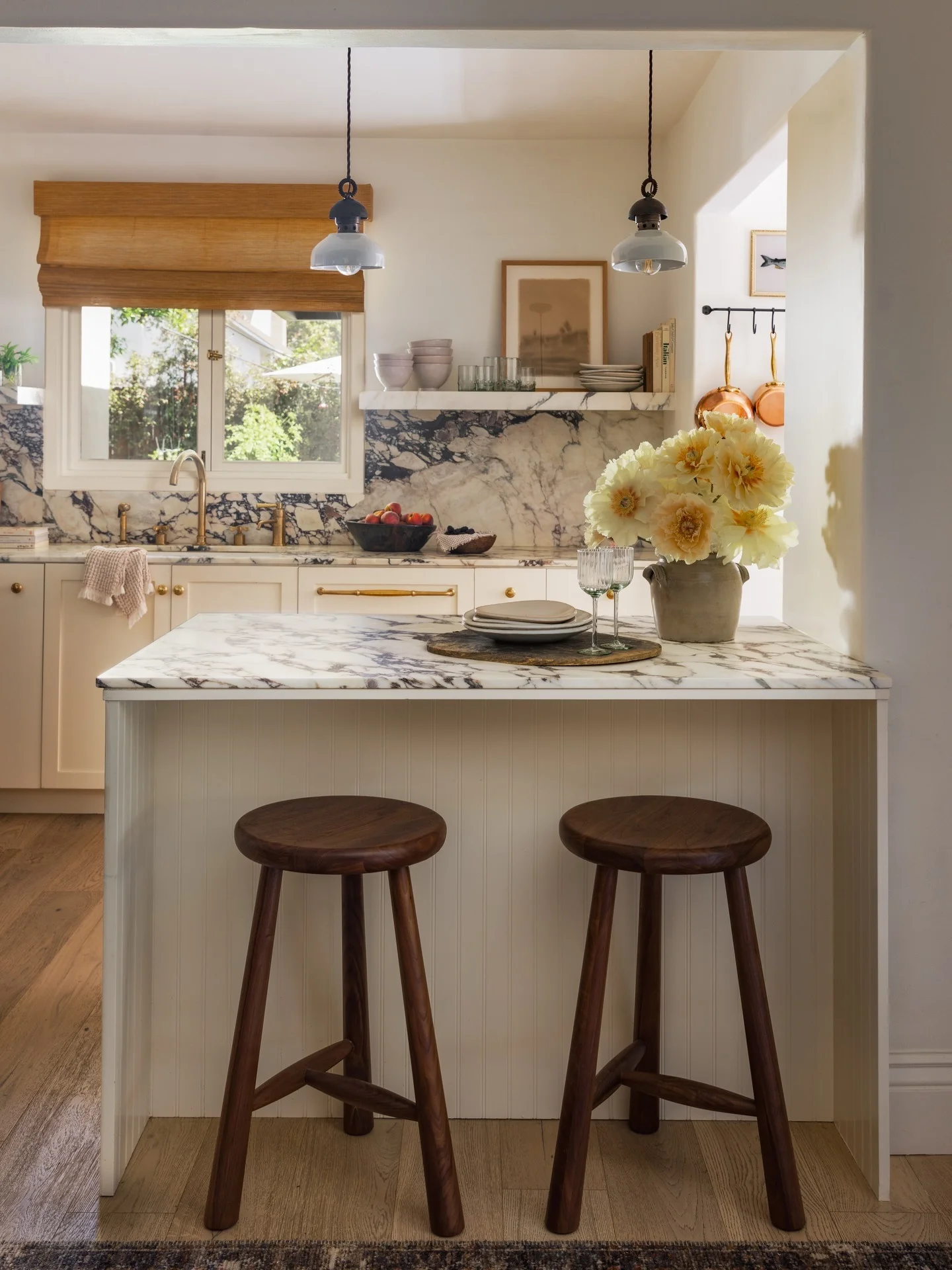 Solid Walnut Stools Offer Sculptural Seating