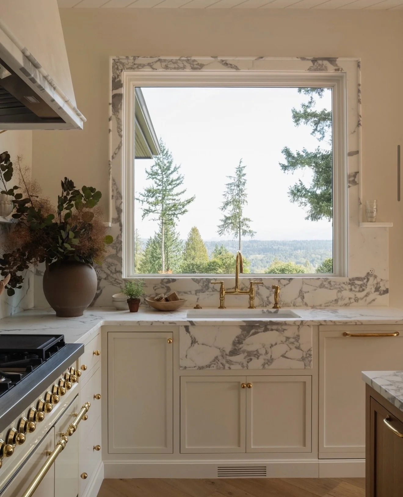 Marble Slab Wraps Sink and Backsplash for a Unified Look