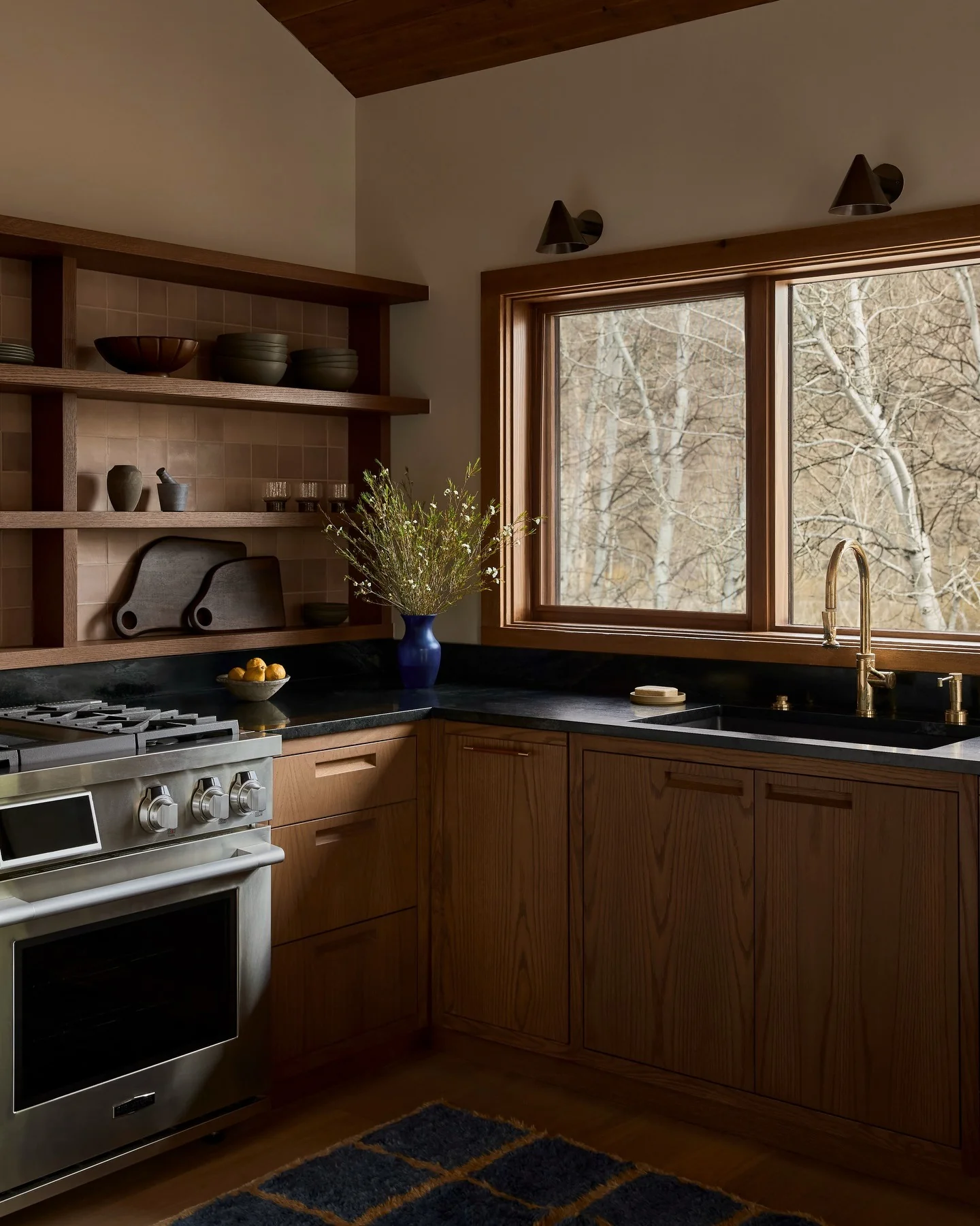 Open Wood Shelving Displays Warm Ceramic Tones